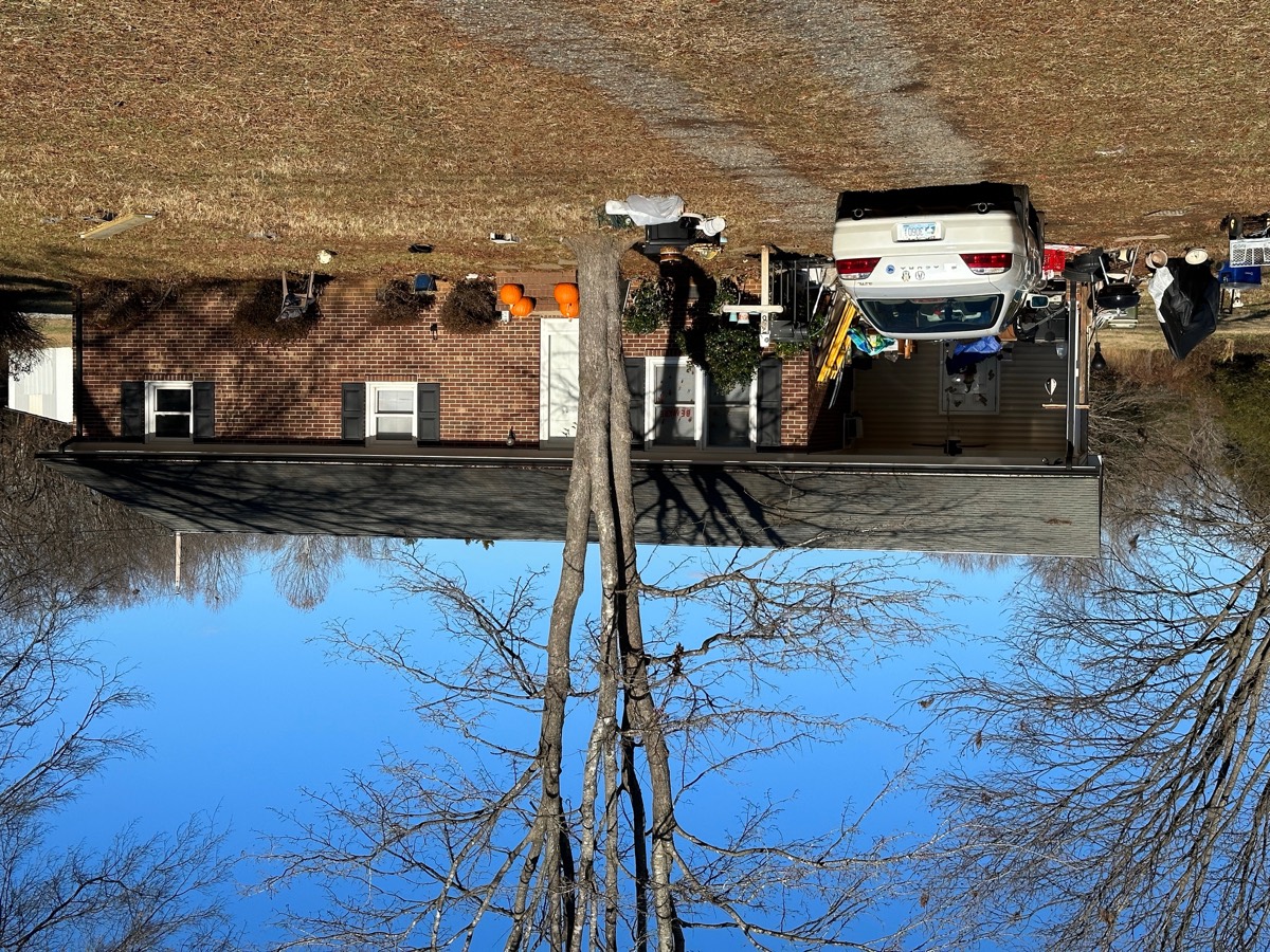 America Home Buyers reviewing a Davidson County property that needs work